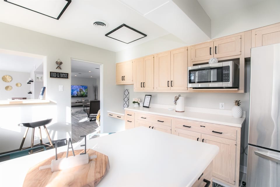 Spacious kitchen with new stainless steel appliances