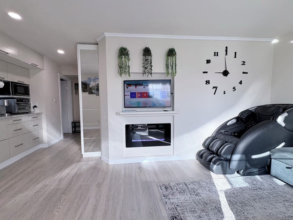 Massage chair, smart tv, electric fireplace 