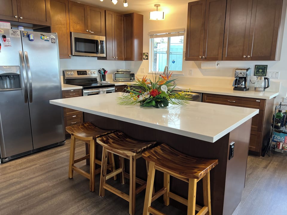kitchen area island with barstools. 