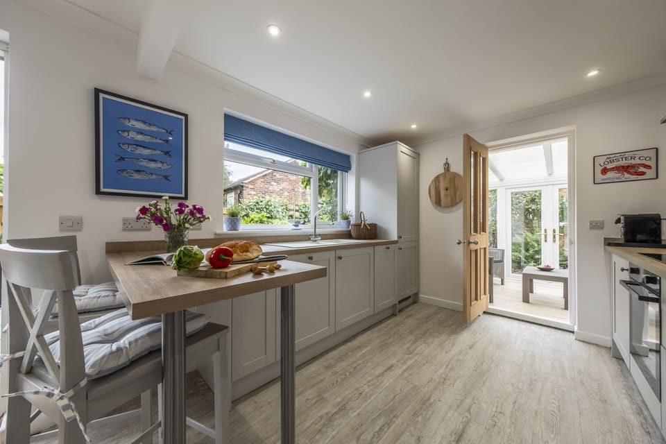 Ground floor: Kitchen access into the conservatory