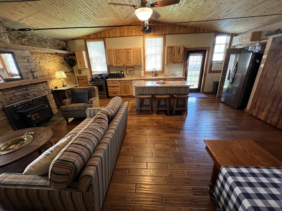 Great Room with wood burning fireplace.