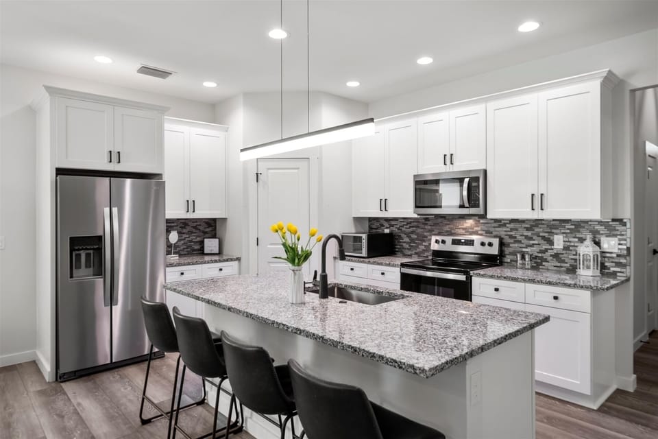 Full size kitchen with all appliances, & a pantry.