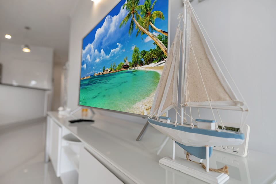 55" SMART TV in lounge and Bedroom 1
