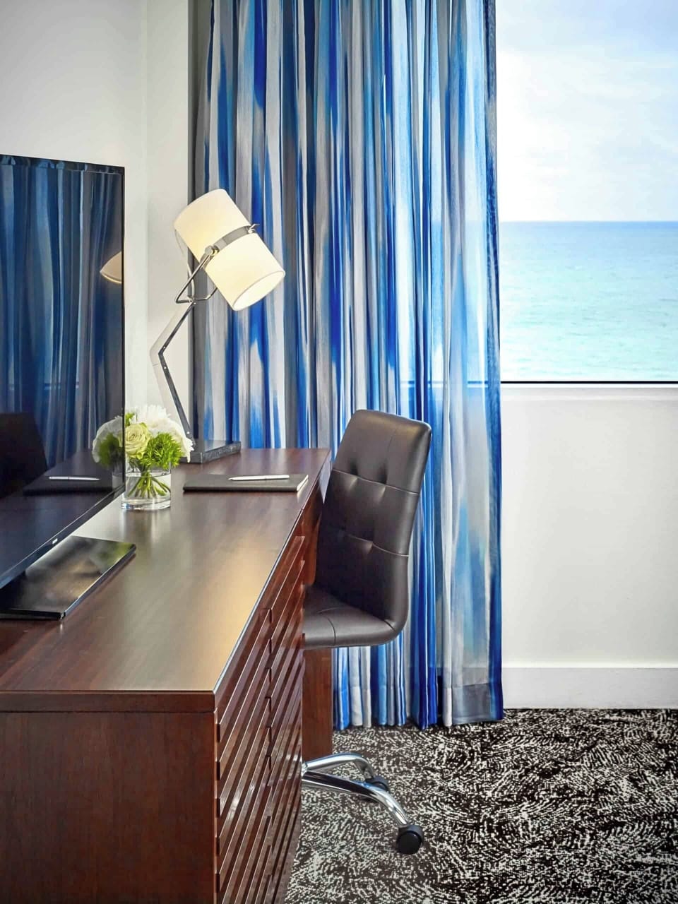 Settle in to work comfortably beside bright ocean views.