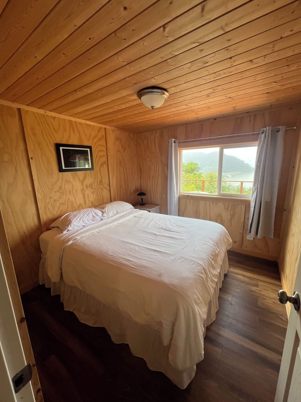 Third bedroom. Double bed with a window to the ocean. 