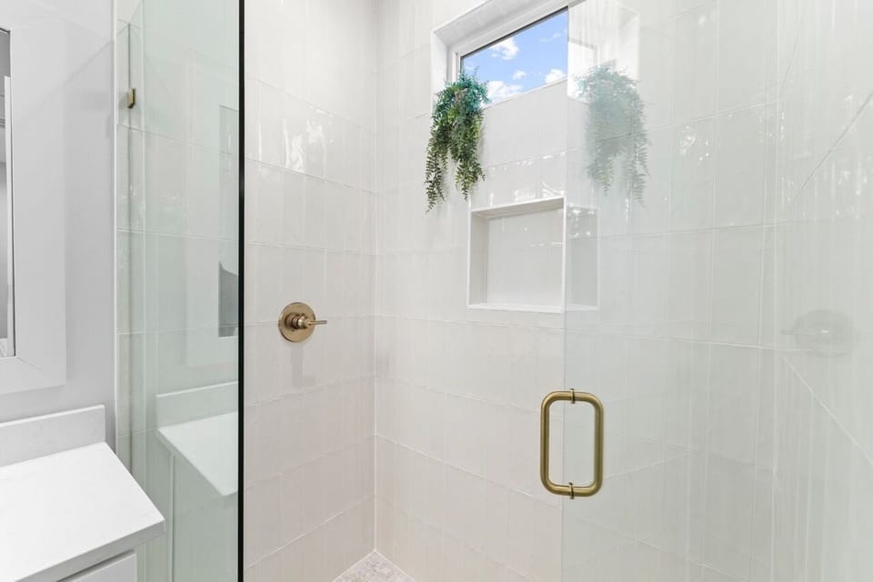 Bathroom #1 has a stand-up shower,
