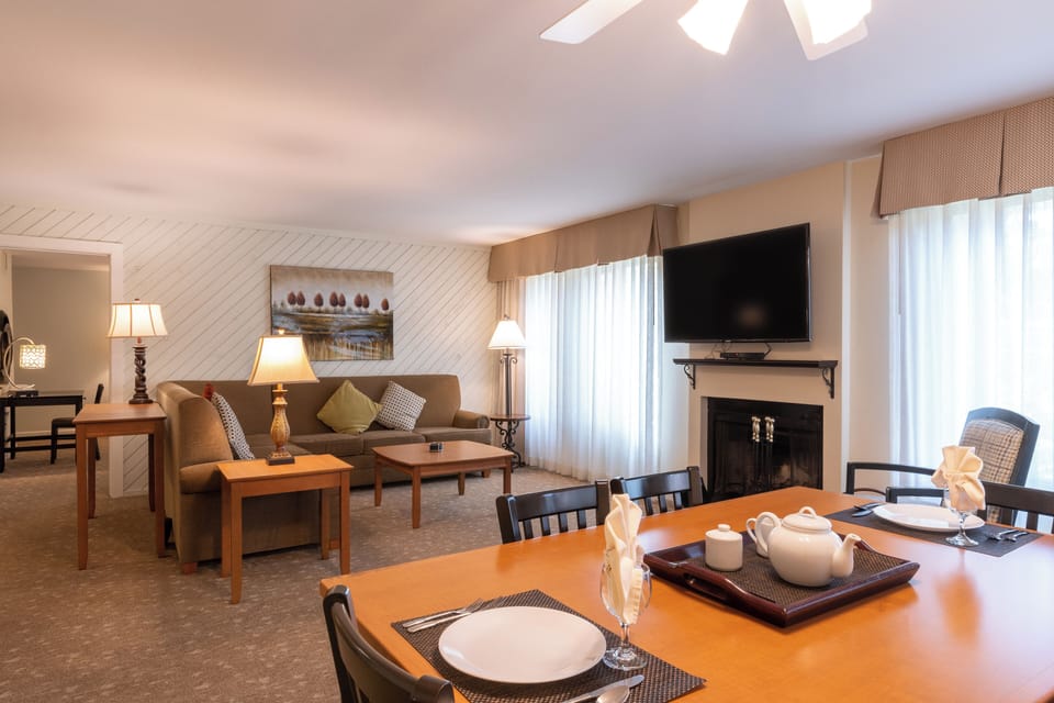 Kick back in the inviting lounge with soft lamps and cushions.