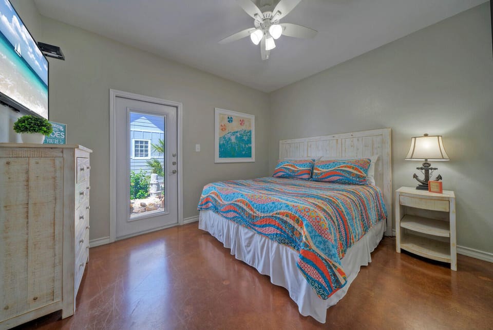 The primary bedroom features a king bed.