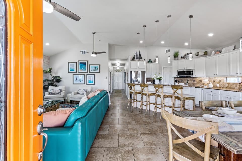 Open-concept living, dining, and kitchen area with plenty of space for everyone to gather.