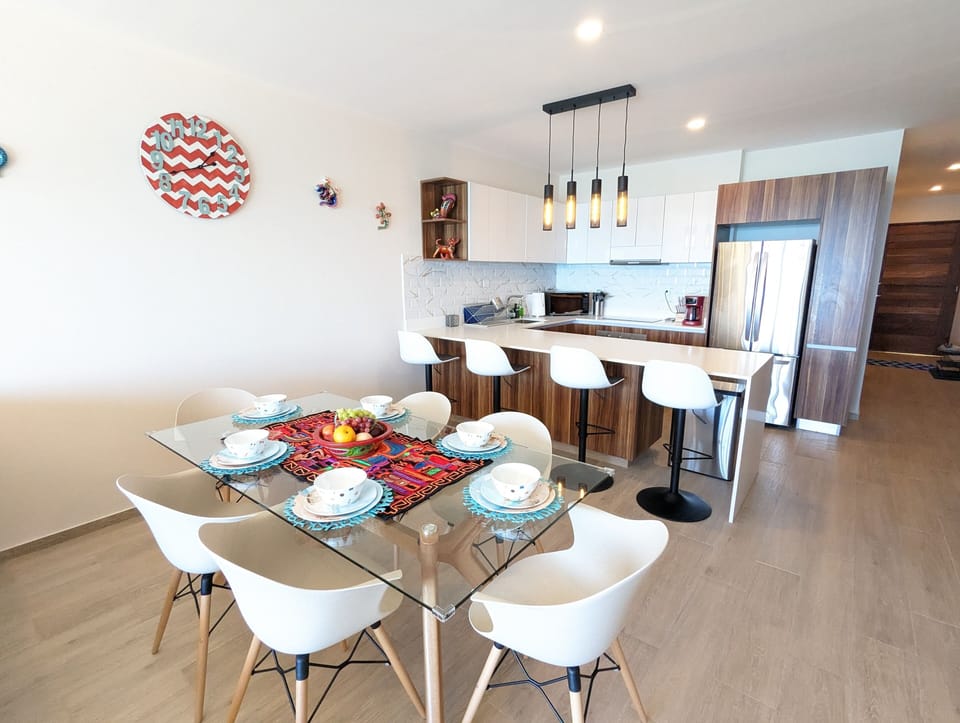 The kitchen is well equipped with a coffee maker, coffee grinder, toaster, rice maker, slow cooker, air fryer, waffle maker, blender, etc.