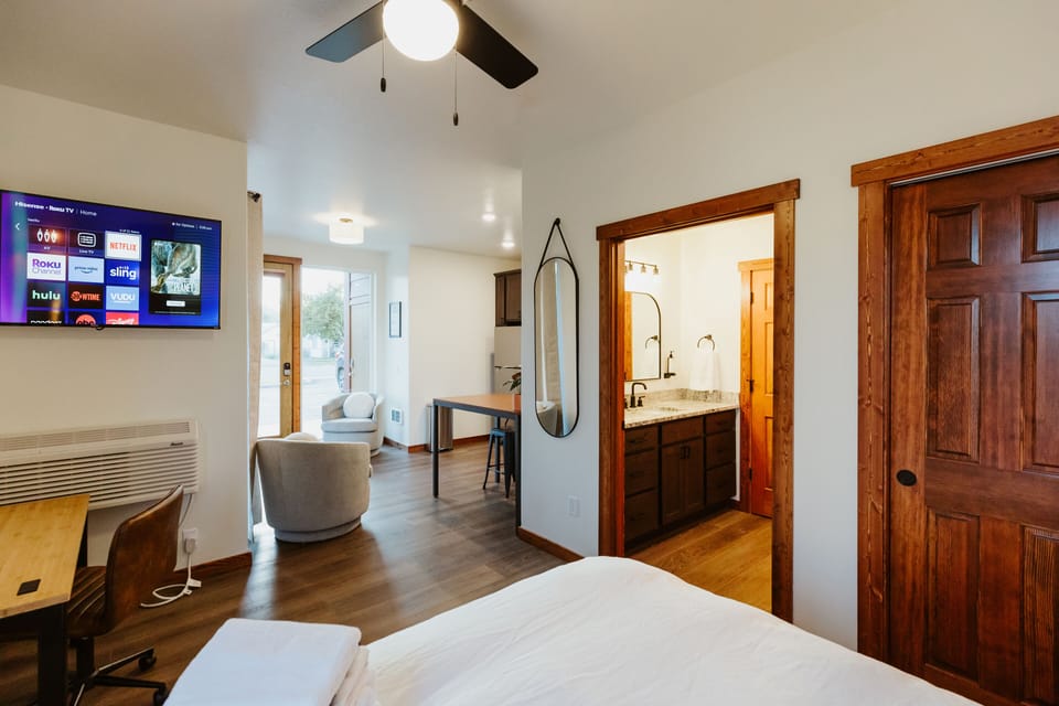 [Living area] Our high ceilings create a spacious environment for relaxing after long days of exploring.