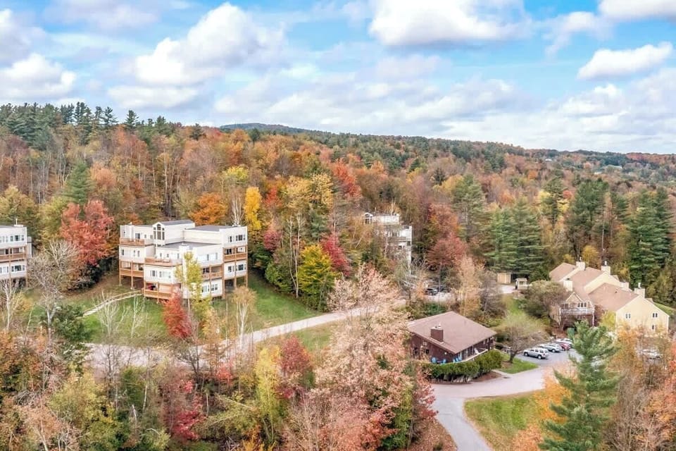 Soar above the enchanting Stowe Resort with this breathtaking aerial view