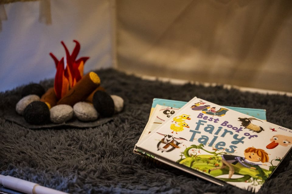 A felt campfire sets the stage for bedtime tales.