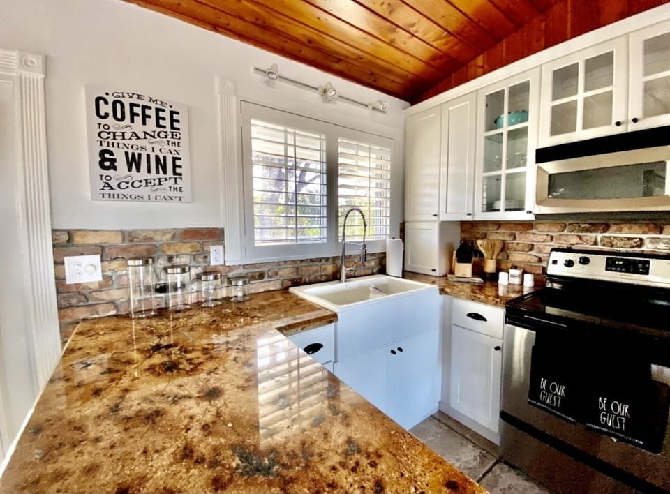 Beautiful kitchen equipt with all appliance and utensils needed