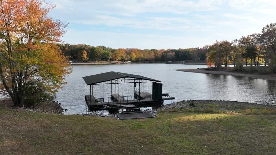 Private lakeside dock perfect for leisure and sunsets.