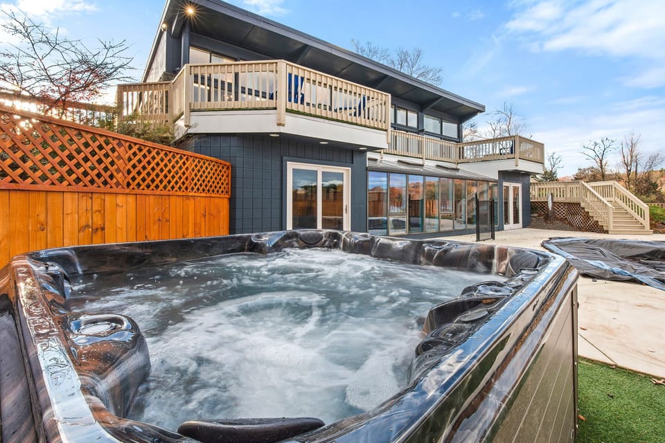 This is a 7-8 person hot tub. Yes, it is open, heated, and running year-round.