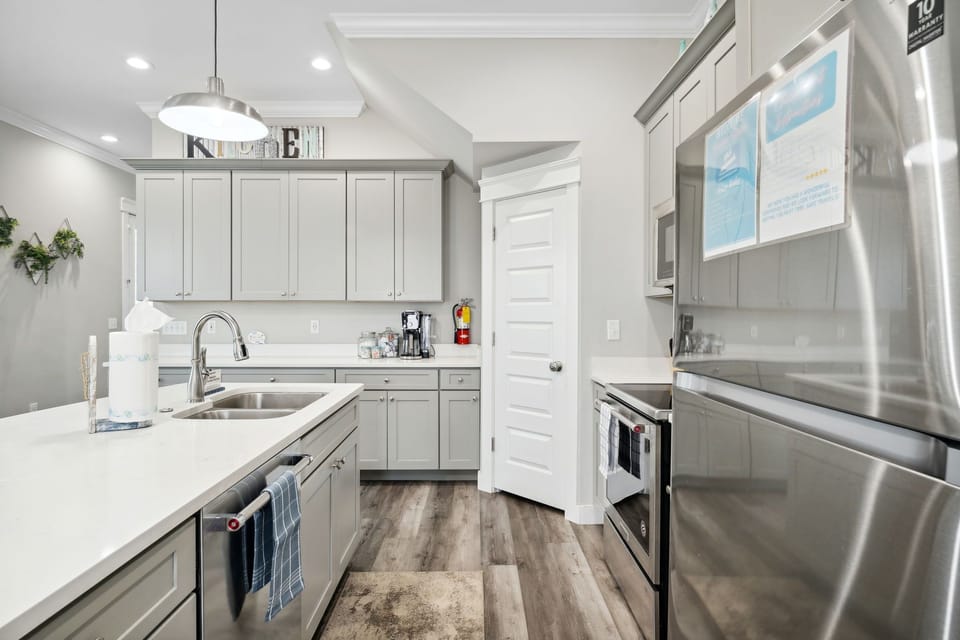 Large kitchen island with dishwasher.