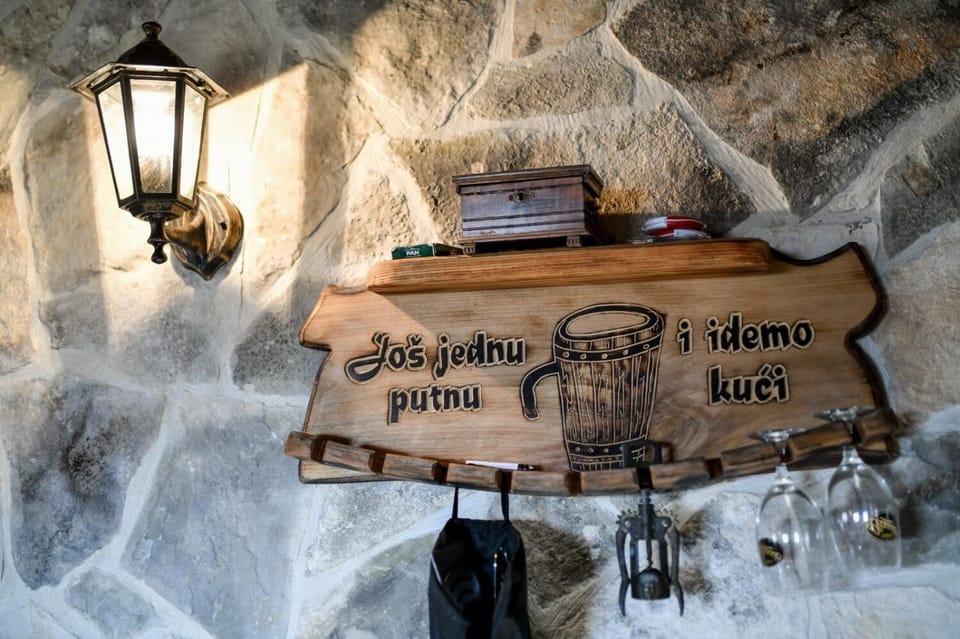 Sheltered dining area with wood fire oven/grill