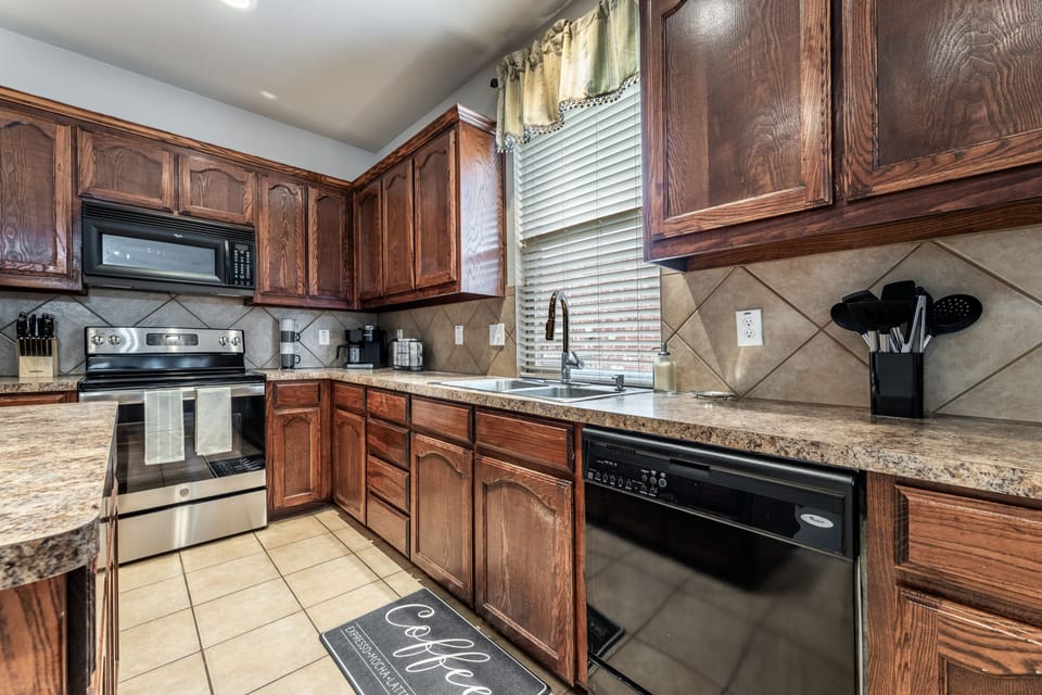 Spacious kitchen with everything you need, from cookware to coffee maker