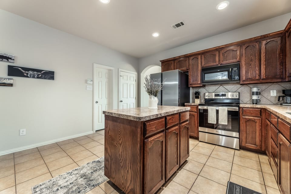 Cook with ease in the fully equipped kitchen featuring modern appliances