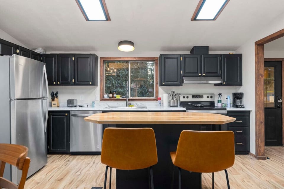 Enjoy meals at the kitchen island, perfect for family meals or casual dining.