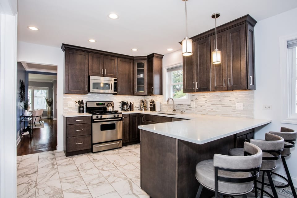 Expansive counterspace and an open concept kitchen is perfect for large groups