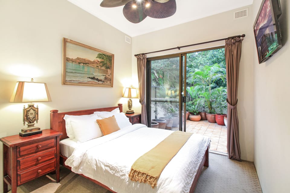 Master Bedroom with Queen Bed, Marble Ensuite , Built-in Robe, TV, DVD, Safe