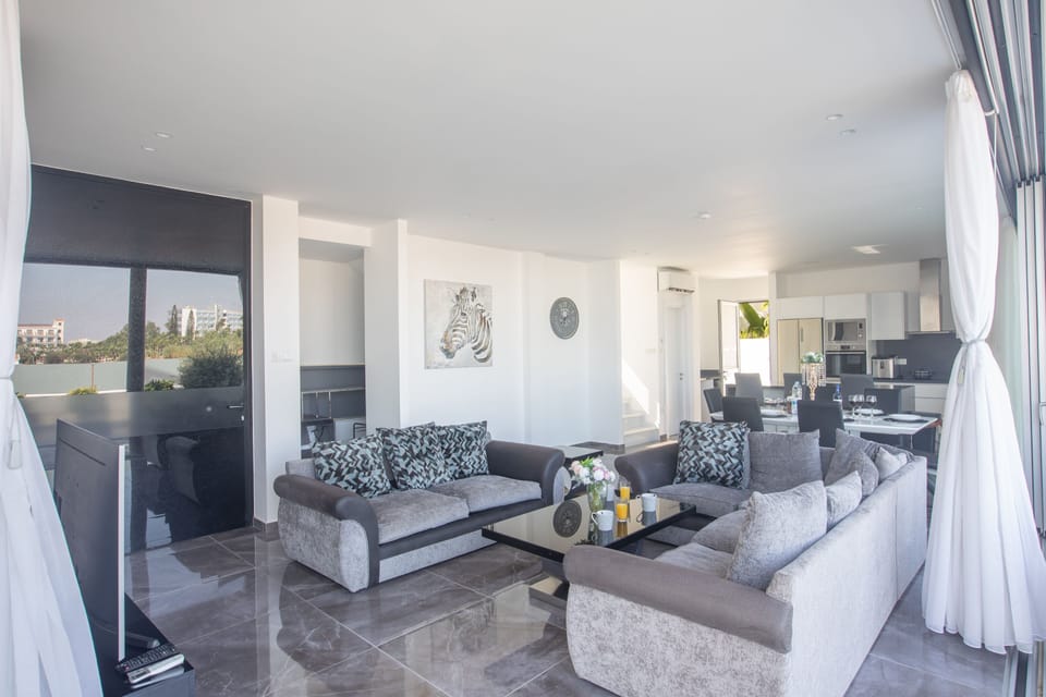Living room with comfortable seating and Smart TV