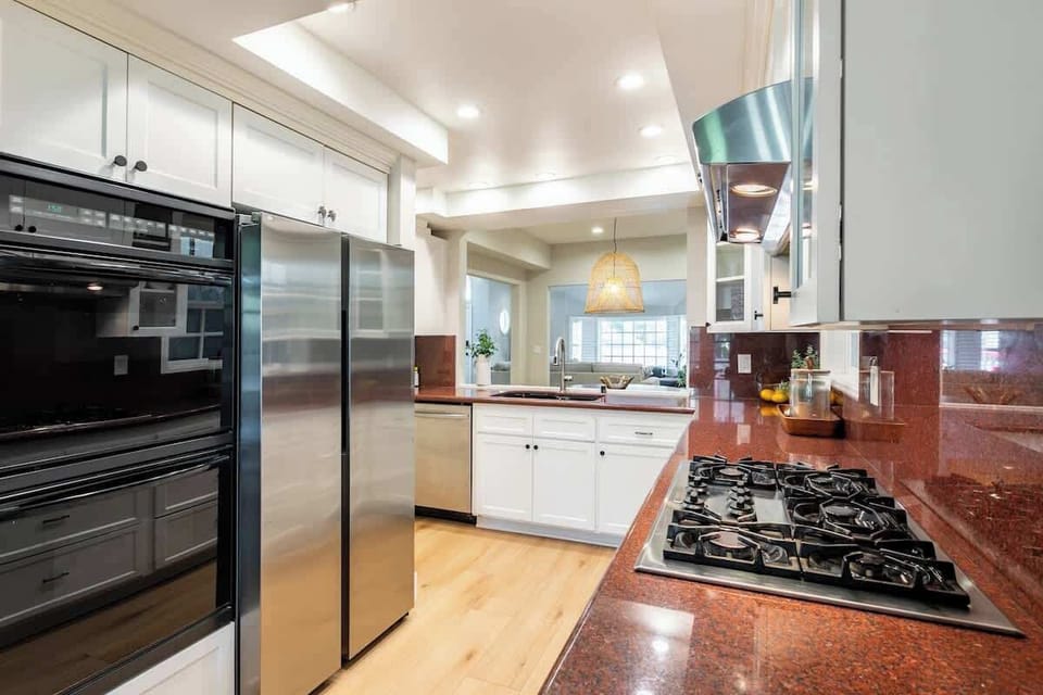Enjoy cooking and dining in this bright, homey kitchen space.