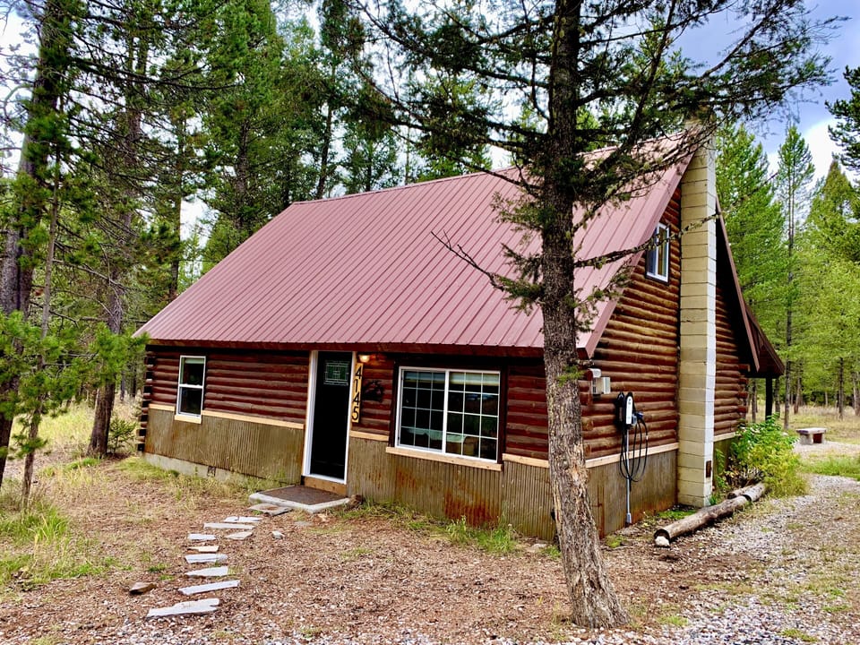 Front of cabin with EV charger.