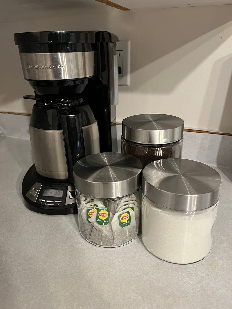 Coffee, green tea and sugar provided