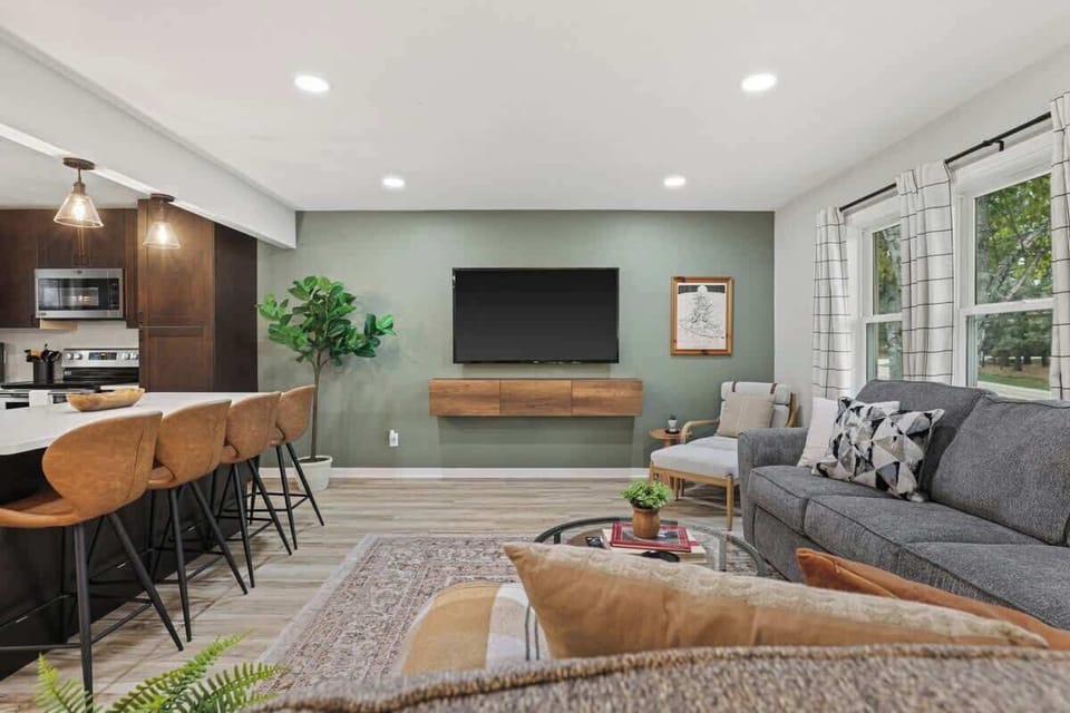 Open concept living, dining and kitchen area.