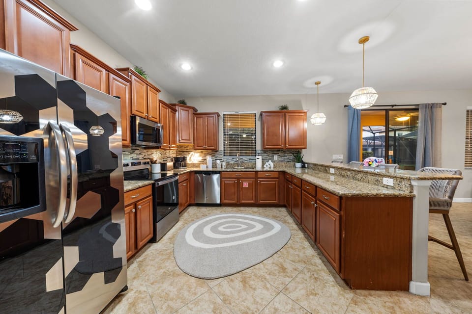 Cook up a storm in our spacious kitchen, featuring cupboards and base cabinets