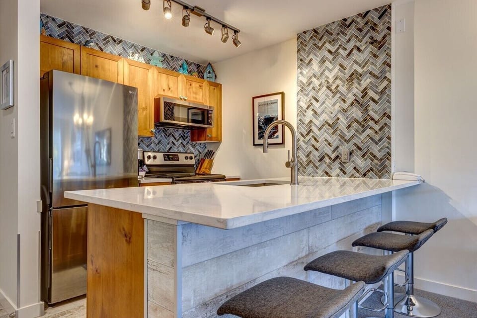 The peaked tiles in the kitchen were no easy feat to install!