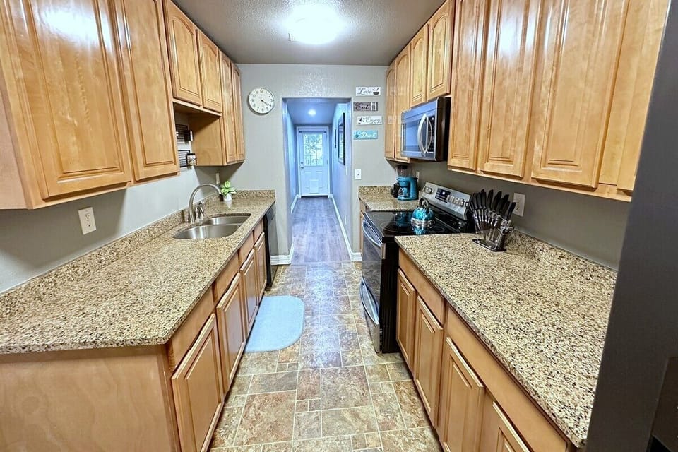 Create memorable meals in our kitchen, stocked with utensils and kitchenware.