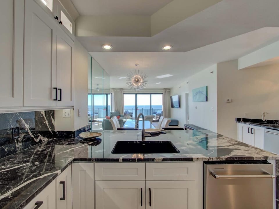 Modern kitchen facing the living area.