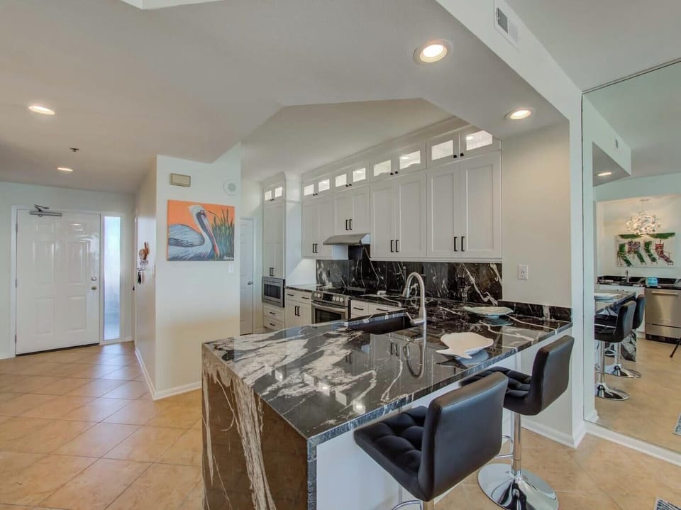 Beautifully updated kitchen with stainless steel appliances.