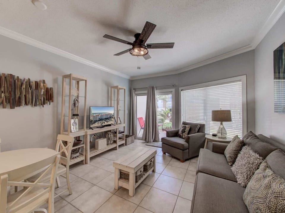 Spacious open concept living area looking out towards the patio.