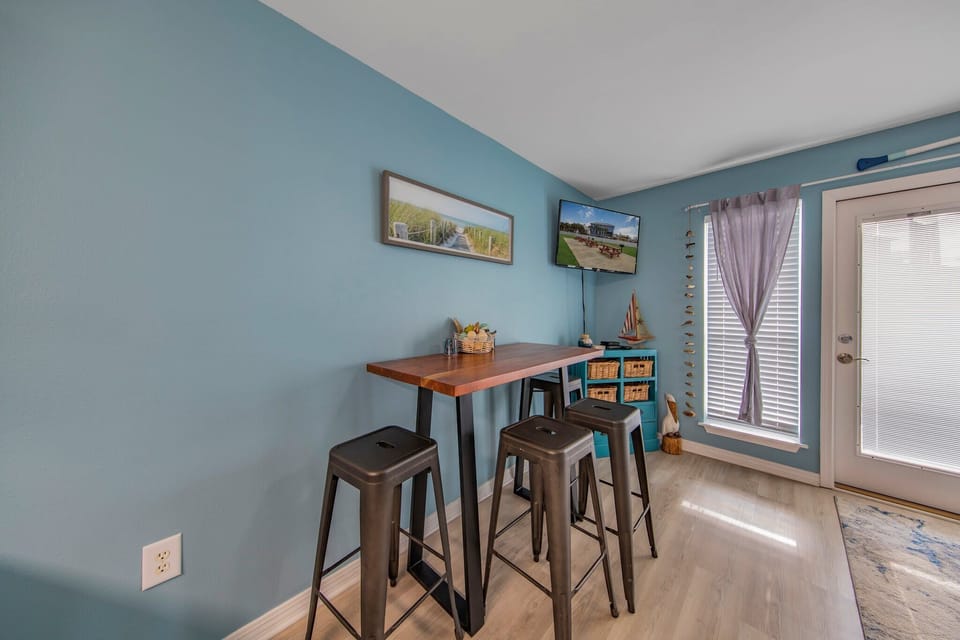 Dining area with kitchen to the left