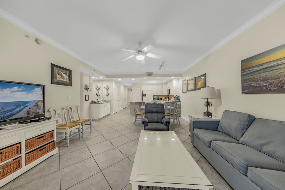 Living space looking into dining and kitchen
