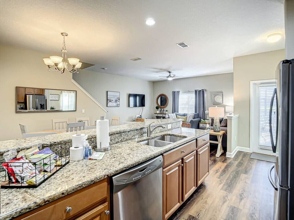 Enjoy a fully equipped kitchen and inviting dining area, perfect for cooking and sharing meals with loved ones