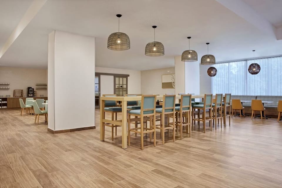 Enjoy casual meals together in the bright communal dining area.