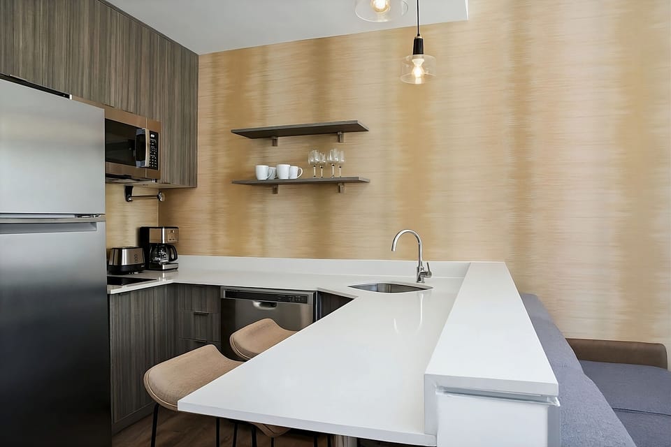 Cook and serve with sleek counters and full-size appliances