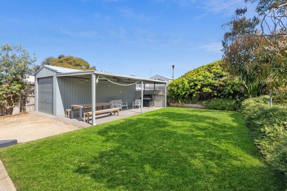 Relax in the sheltered north-facing alfresco while the kids play in the fully fenced backyard