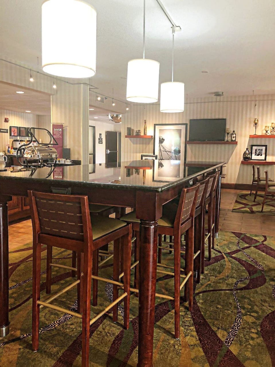 Gather for cocktails and conversation in this stylish lounge bar.