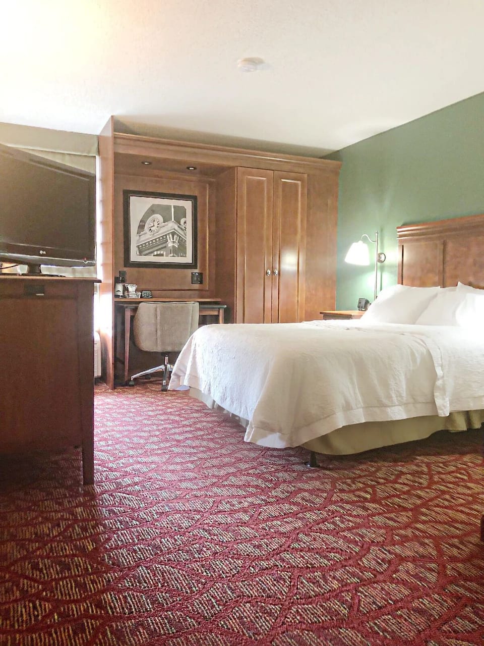 Lounge comfortably with a dedicated work nook and soft lighting.