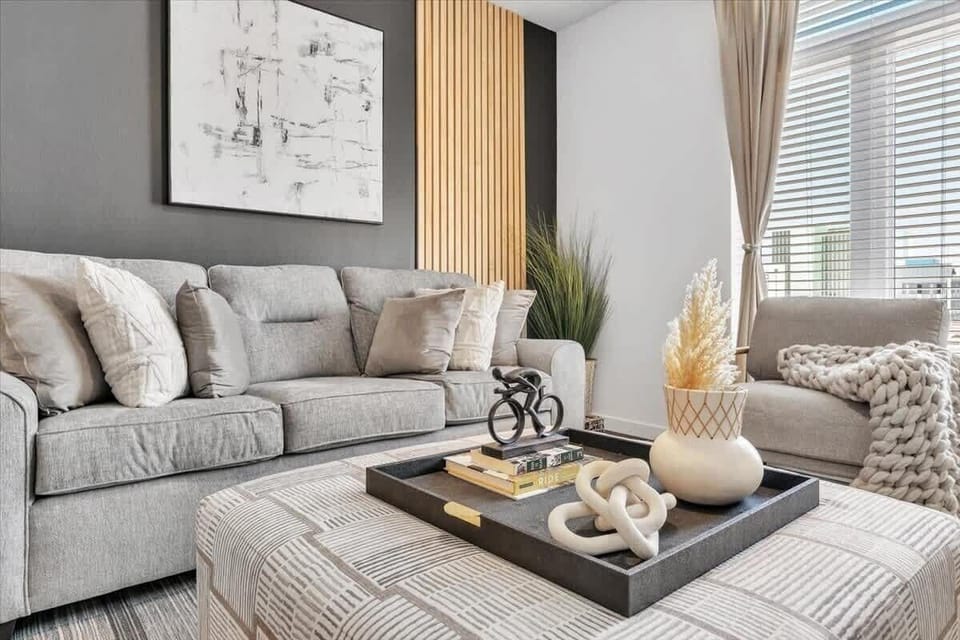 Enjoy the comfort of our inviting living room, complete with a flat screen TV and plush seating. Perfect for families, this space is great for movie nights, games, and making lasting memories together.