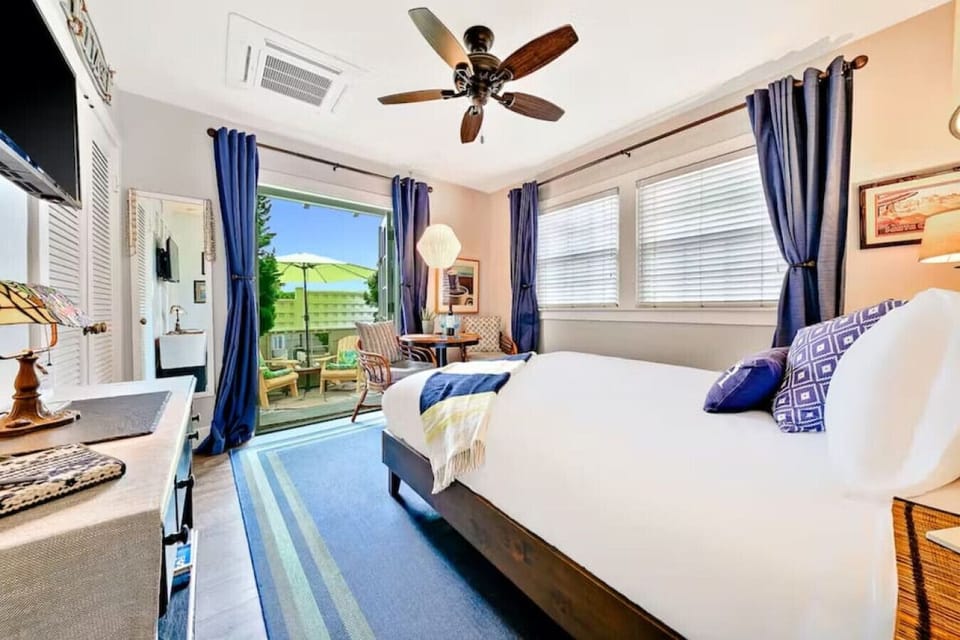 Let the ocean breeze in. The cottage has french doors that open up to an outdoor patio area.