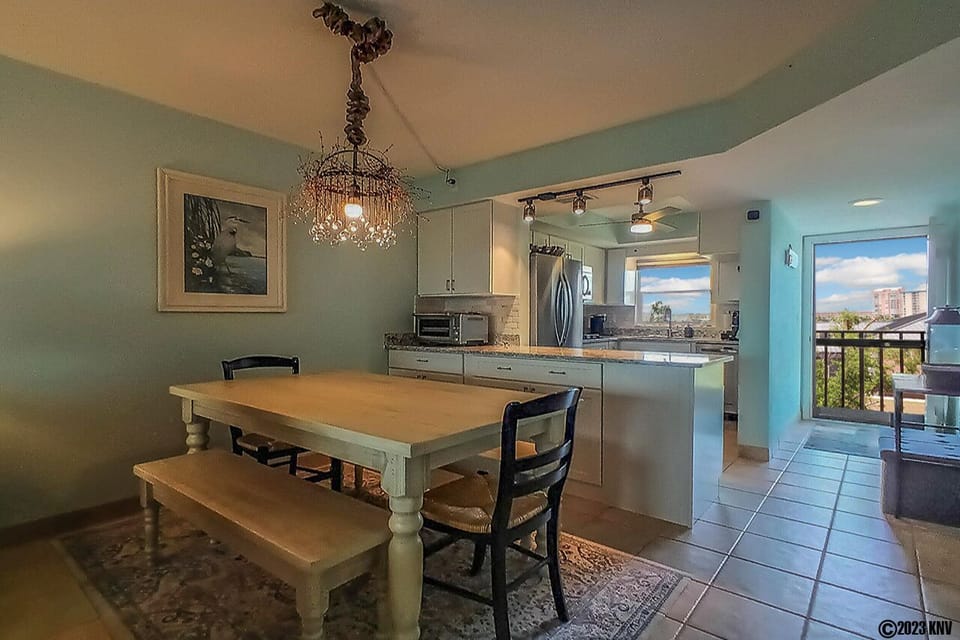 Dining Area features a large table with bench seating