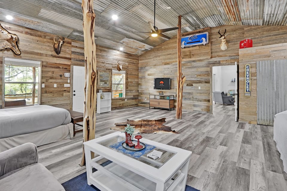 There is a TV across from the queen bed